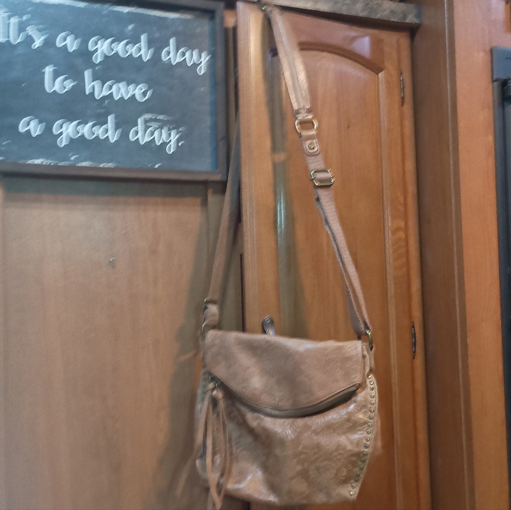 The Sak Elegant Tan Embossed Leather Zippered Adjustable Shoulder Bag